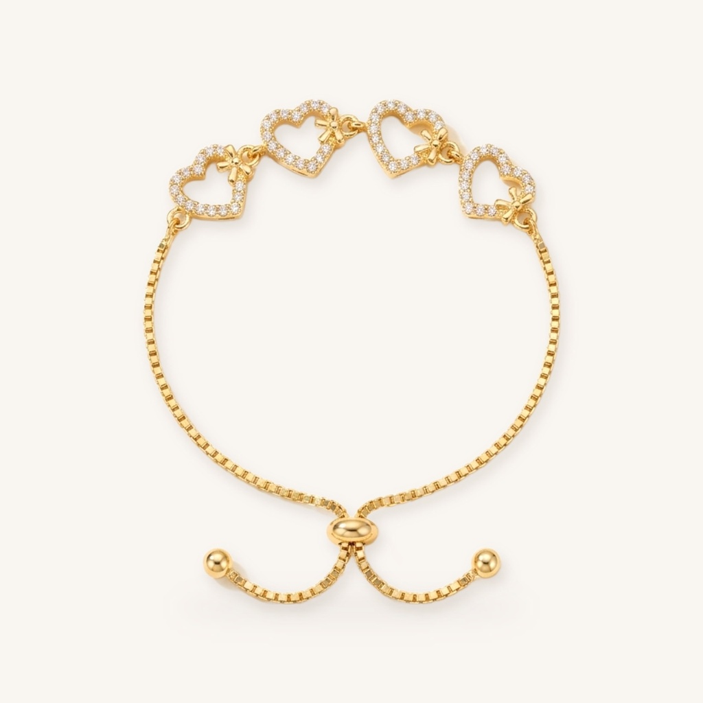 [VPULOL0906025] Pulsera Corazones y Moños · Oro Laminado 18K