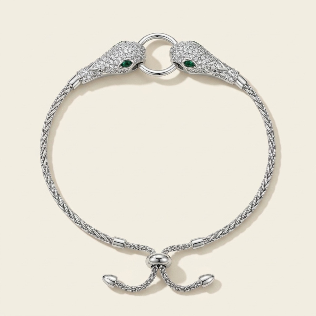 Pulsera Serpientes Tono Esmeralda · Baño de Rodio